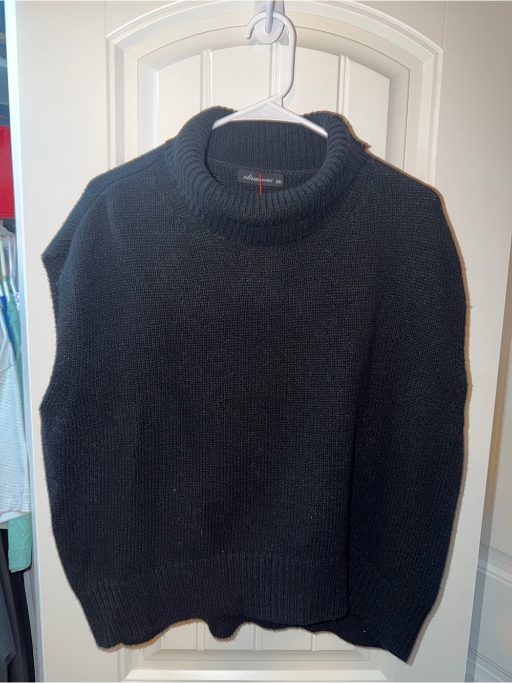 Olivaceous women's black mock neck knit sweater vest